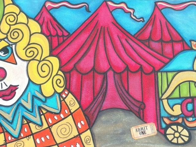 a clown with yellow hair and green hat infron of a circus tent and wagon